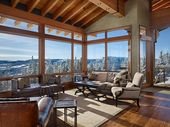 Rustic home in the Rocky Mountains showcasing a rock-climbing wall