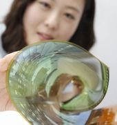 LG Builds a TV That You Can Roll Up Like a Poster