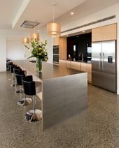 This Birch Plywood Kitchen with a 6mm Stainless Steel benchtop is enhanced by th…