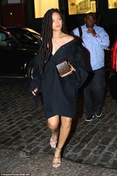 Rihanna legs it through New York in edgy black dress and silver heels