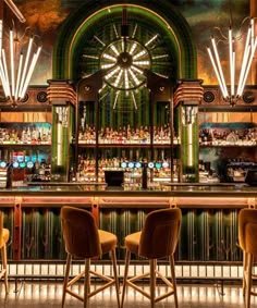 ellis design studio adds art deco elements within industrial, electric bar interior in london